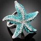 Luxusní prsten bílé zlato, mořská hvězdice, modrý Swarovski krystal J0389