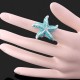 Luxusní prsten bílé zlato, mořská hvězdice, modrý Swarovski krystal J0389