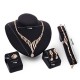 Luxusní dámský zlatý set - náhrdelník, náušnice, náramek, prsten s krystaly 