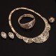 Luxusní dámský zlatý set - náhrdelník, náušnice, náramek, prsten s krystaly E
