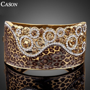 Luxusní zlatý masivní náramek s krystaly, motiv leoparda