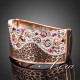 Luxusní zlatý masivní náramek s barevnými krystaly, motiv leoparda